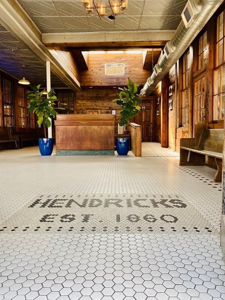Hendricks Est. 1860 spelled out in the tiled lobby floor